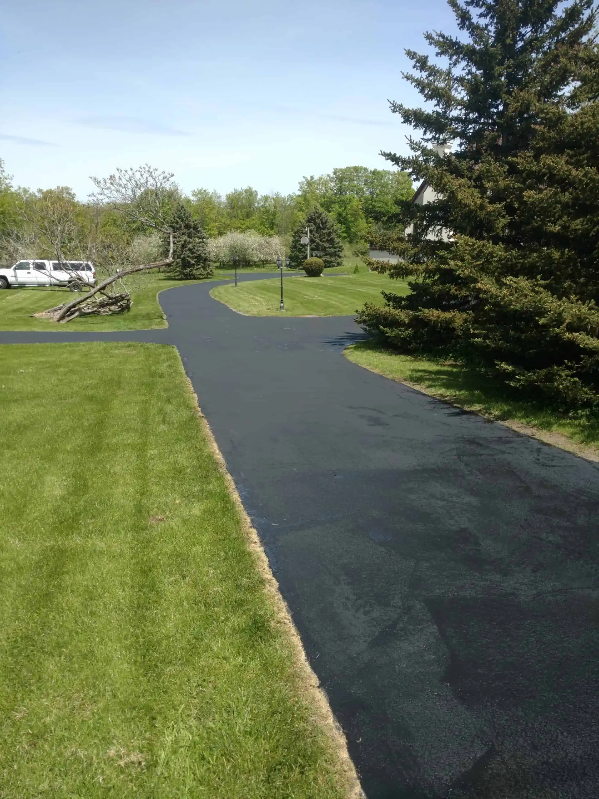 Elevate the exterior of your Westmoreland or New Hartford  home with the protective power of asphalt sealcoating! 